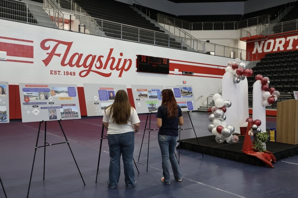 Presentation boards with a timeline of NISD's history