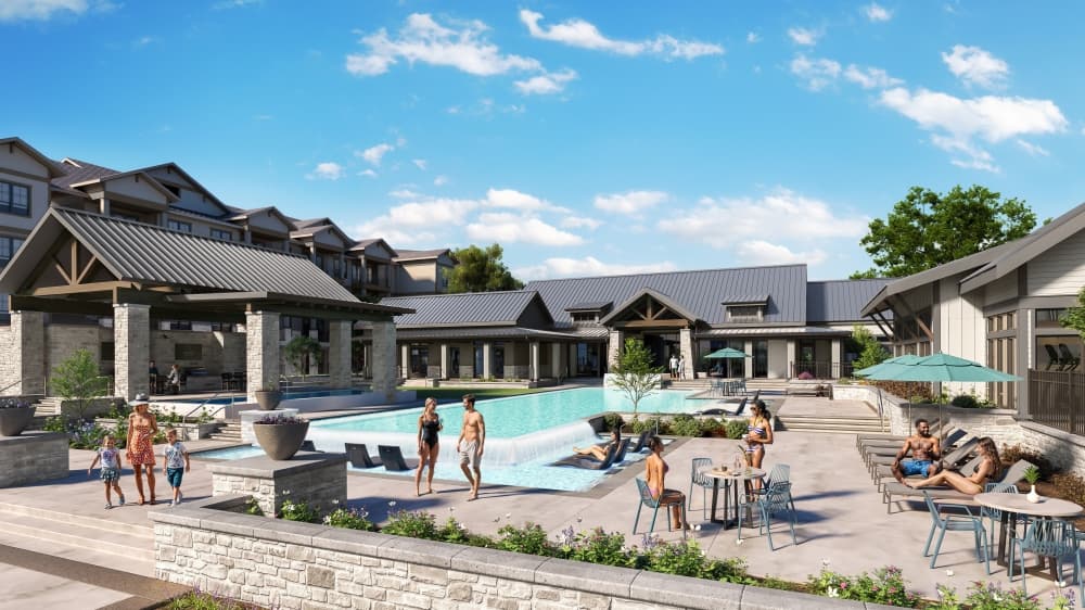 Resort-style swimming pool with lounge seating and outdoor dining at Asher at Towne Lake luxury apartments in Cypress, Texas