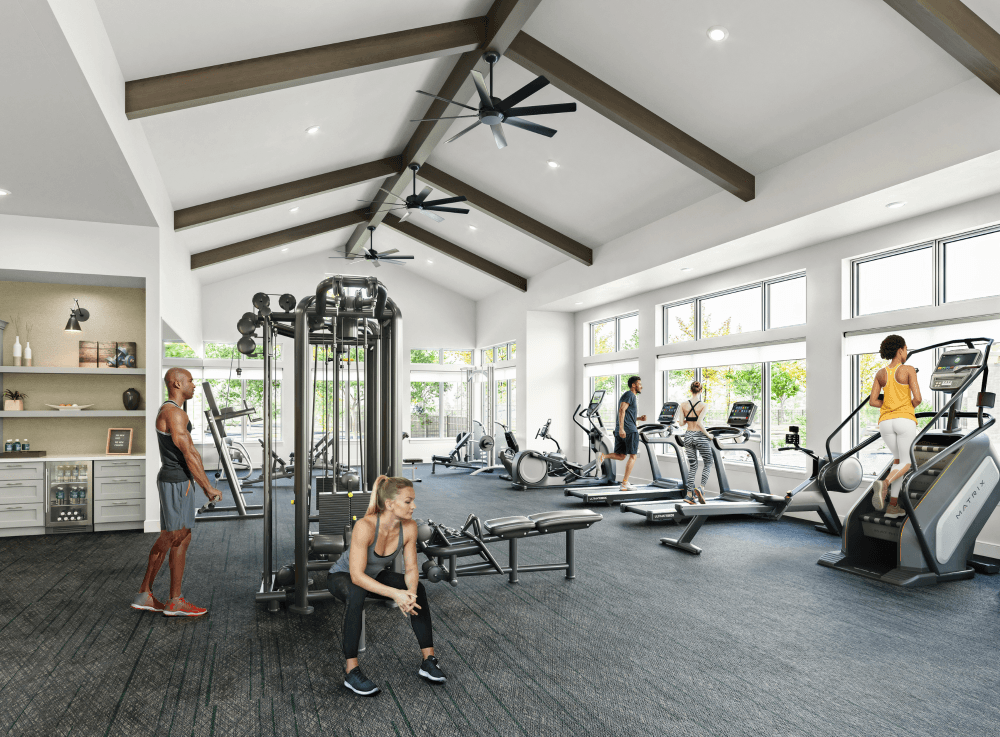 State-of-the-art fitness center with cardio machines, free weights, and yoga space at Asher at Towne Lake luxury apartments in Cypress, TX, showcased during the August 23 grand opening event with exclusive two months free rent incentive.