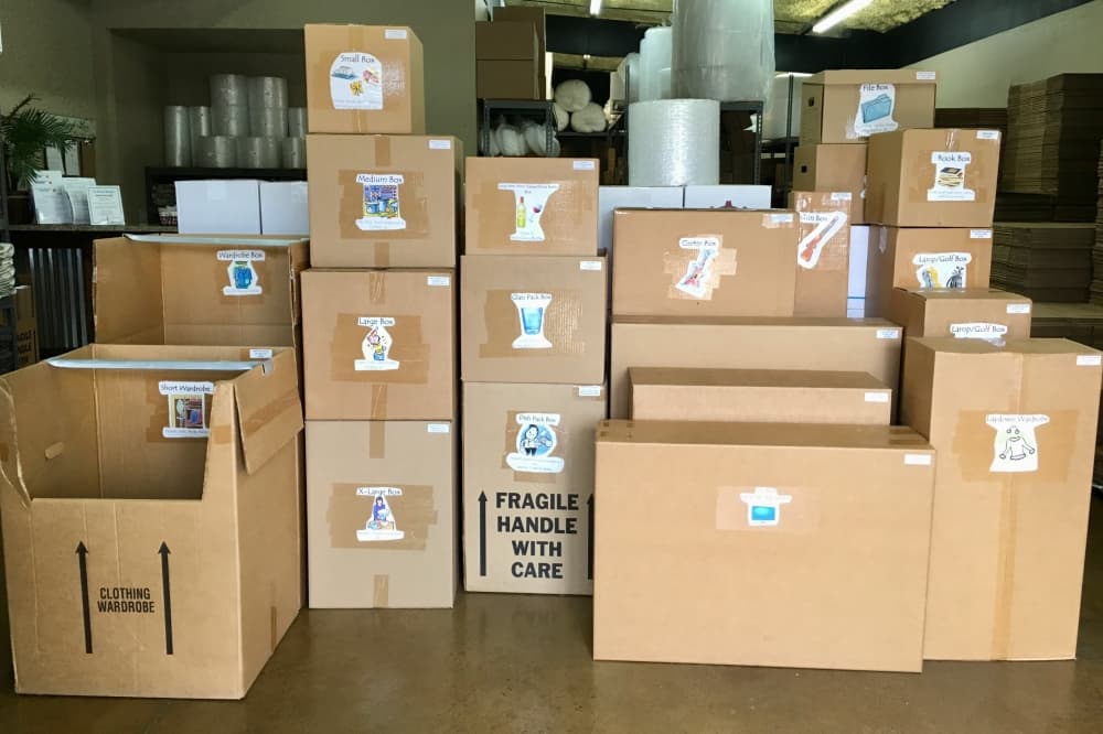 Half Price Boxes to mark 1 year of moving, shipping solutions in Porter