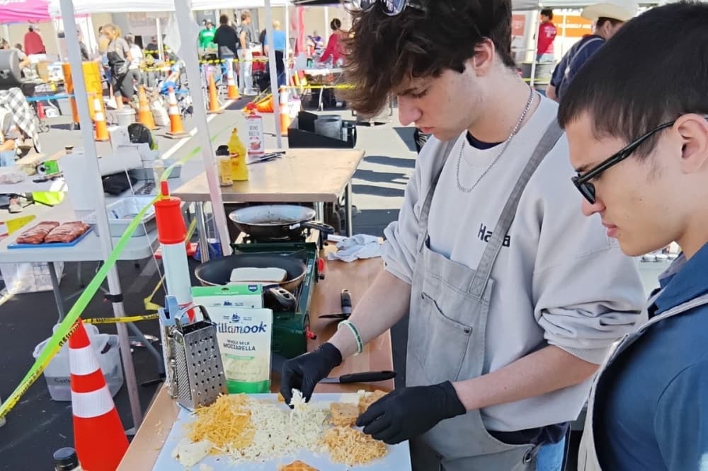 A look behind the grill: TMHS Rolling Blue BBQ team cooks up state win