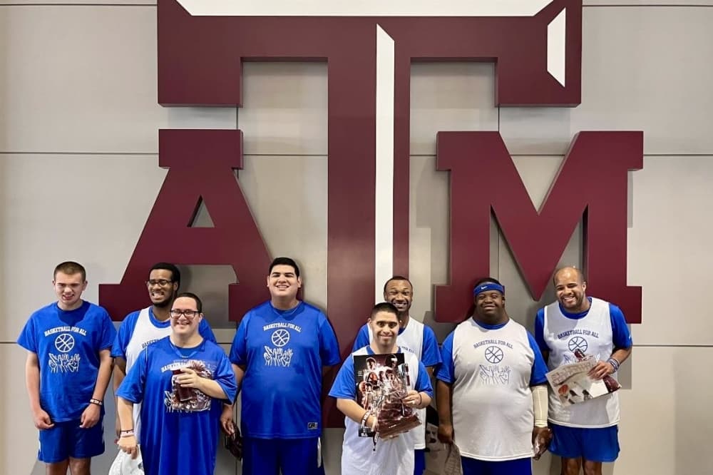 Basketball for All participates in scrimmages during halftime at college games, including Texas A&M University. (Courtesy Basketball for All)