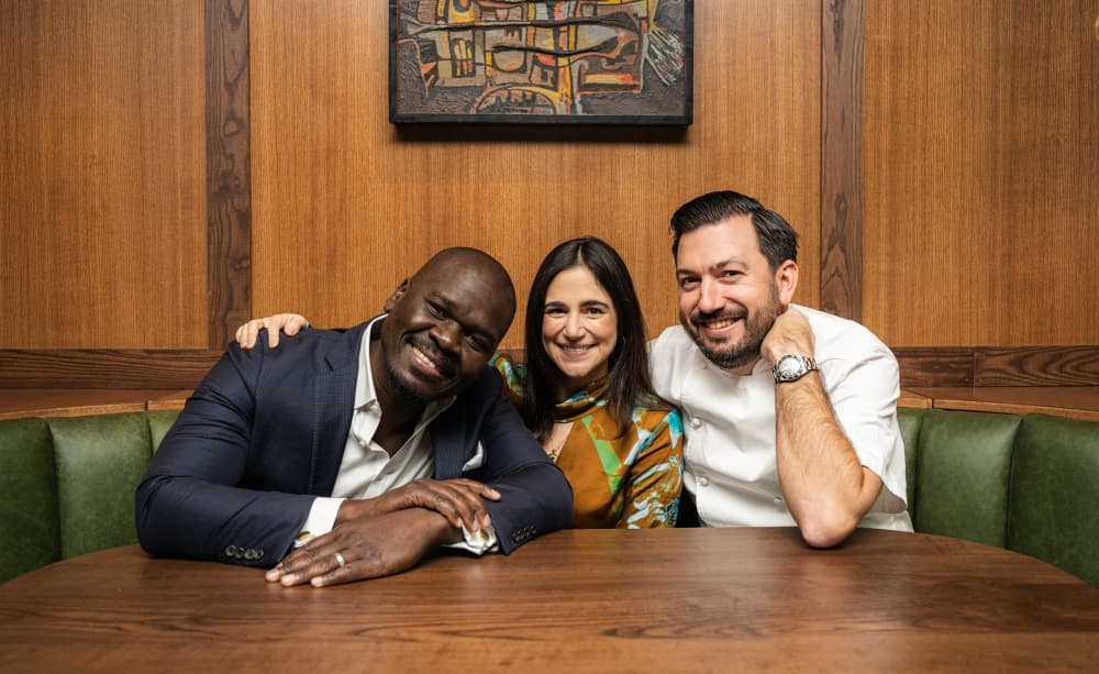 three people at a table