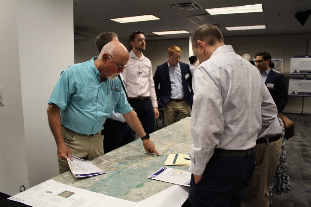 people look at a map