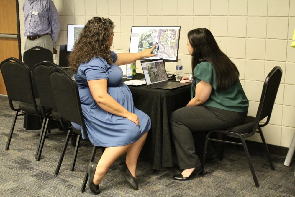 people look at a map