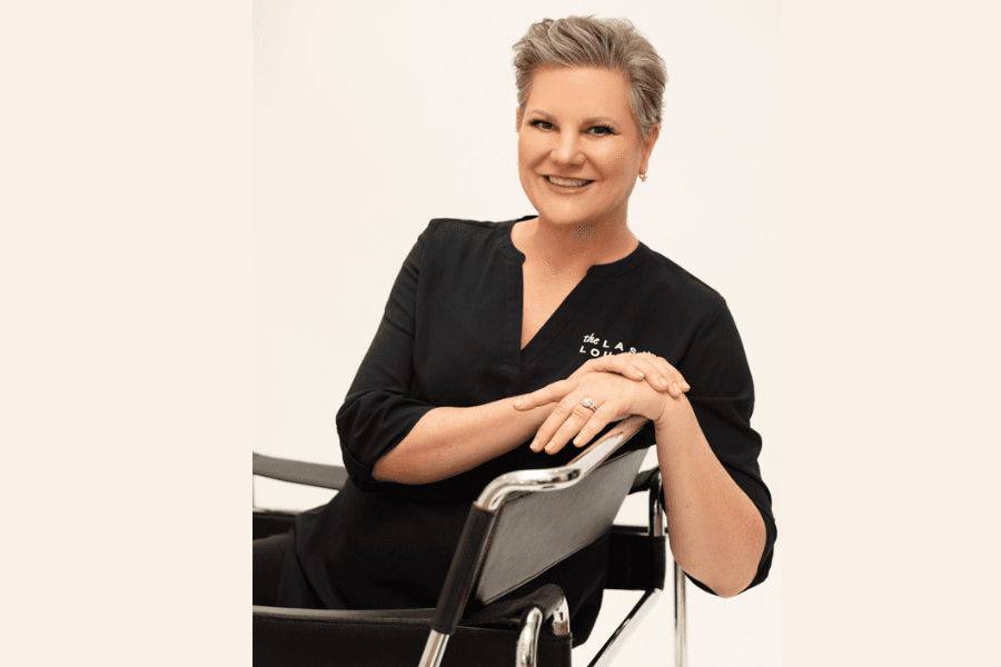 Owner Noelle Boyle standing inside The Lash Lounge Austin, where empowerment, relaxation, and professional care come together for every guest in Austin. 