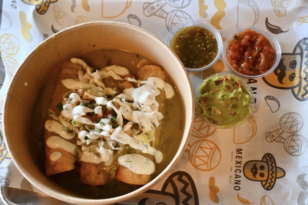Mexicano's enchiladas come with tortillas stuffed with chili con carne and a beef stew with beans and cilantro. (Roo Moody/Community Impact)