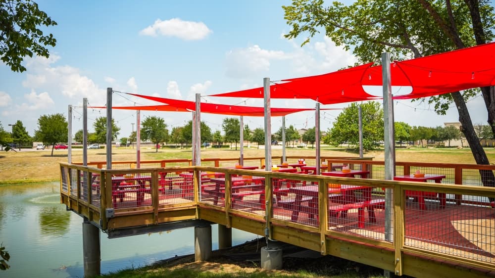 The pier over a pond at Te'jun Texas Cajun.