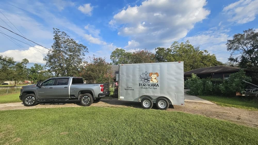 Truck pulling Fur-Vana Mobile Pet Spa trailer