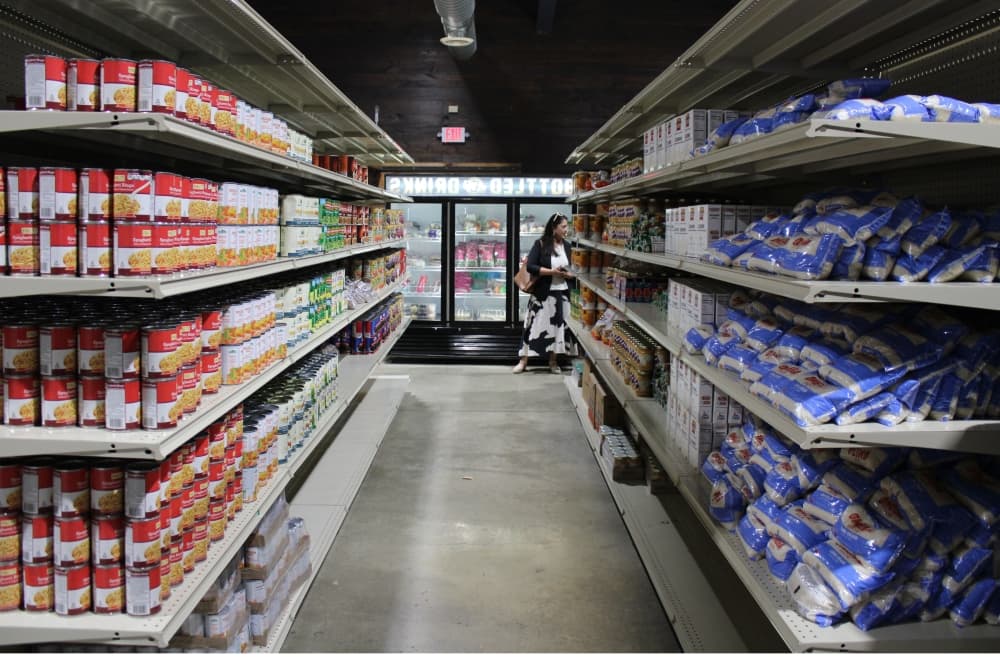 Pictured is an aisle of free groceries.