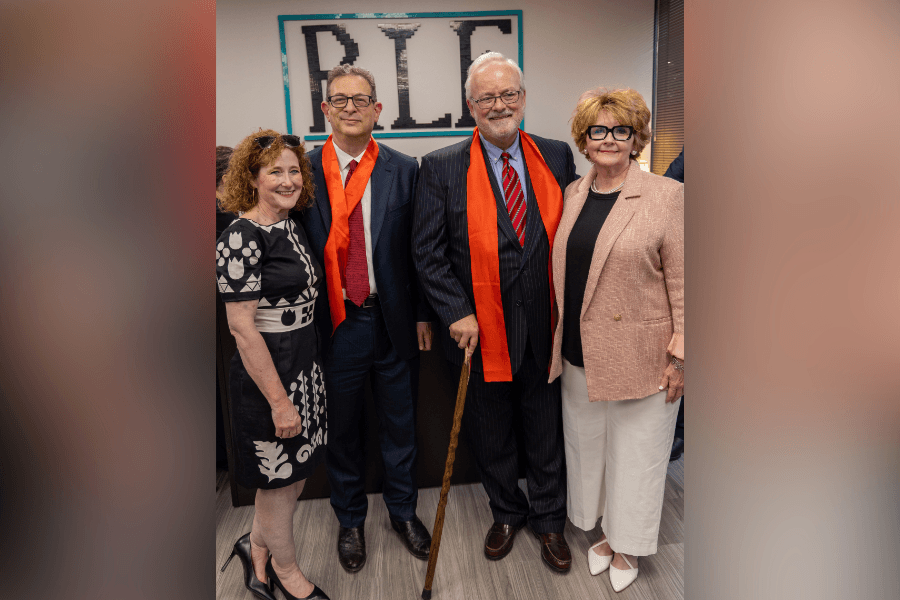James Rosenblatt and Tim Power of Rosenblatt Law Firm with their wives. (Courtesy Rosenblatt Law Firm)