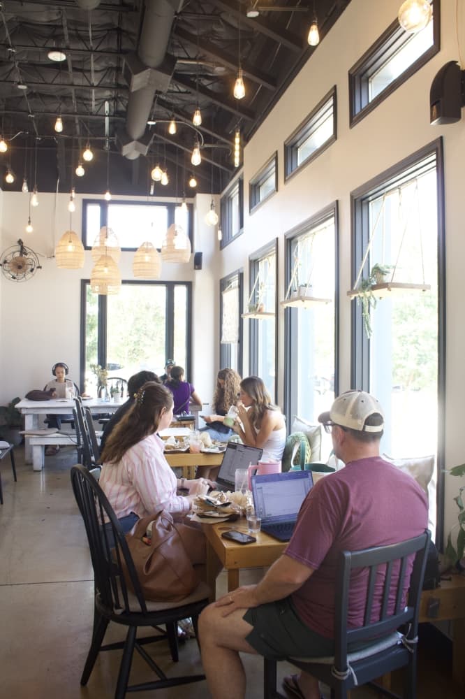 Grutogi Bistro opened its doors in May 2024, providing a peaceful experience for customers with lots of plants, comfortable seating, natural light and an emphasis on service. (Mary Katherine Shapiro/Community Impact)
