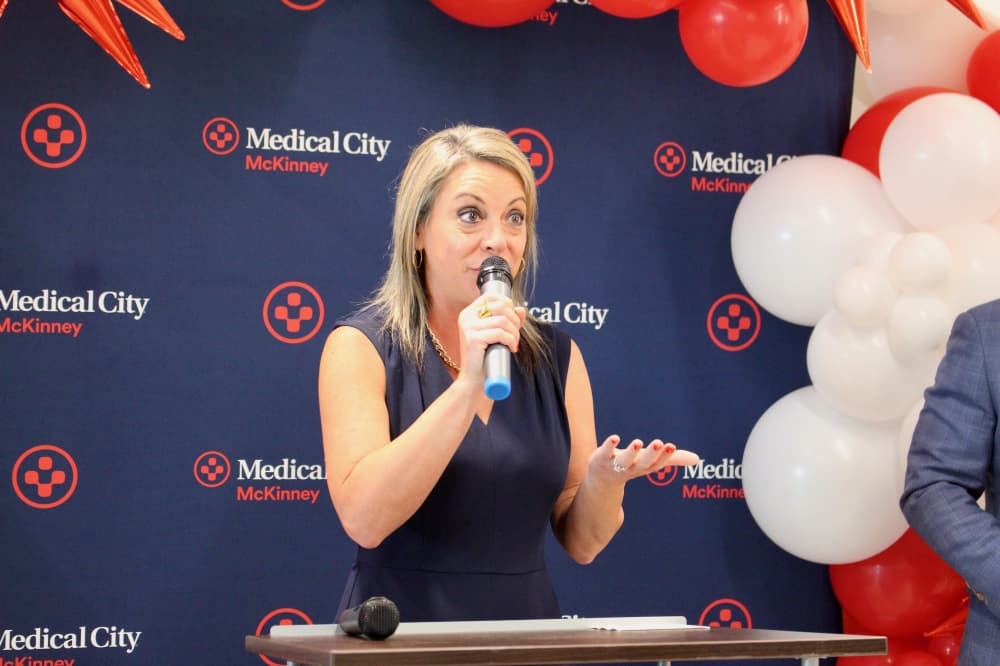 Lisa Hermes, president of the McKinney Chamber of Commerce, speaks during a ribbon cutting event held Sept. 4 for the hospital's new medical office building.