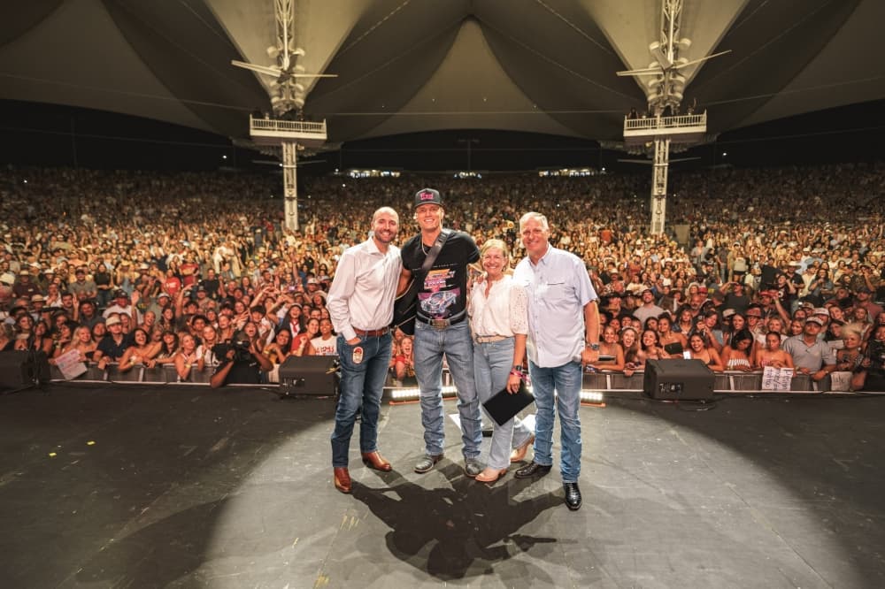four people on stage