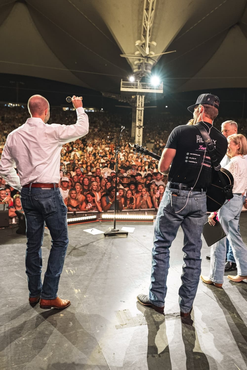 three people on stage