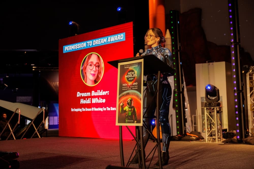 An image of a speaker at the previous year's conference. 