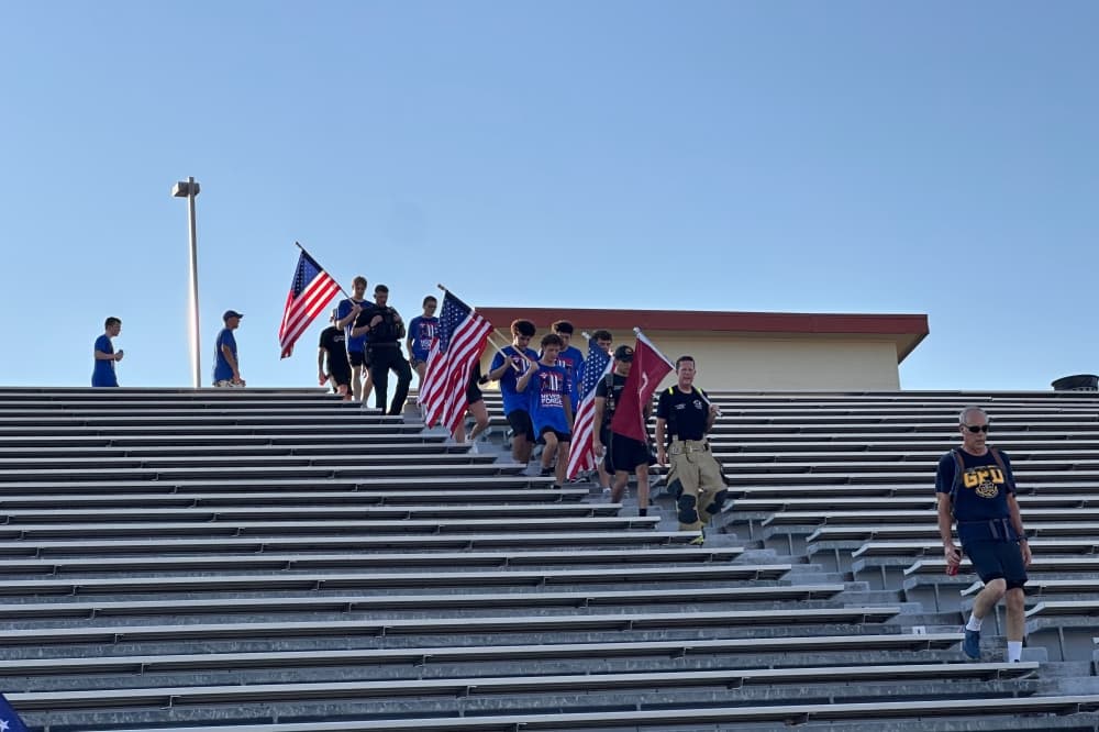 Running down the stairs at Mustang-Panther stadium