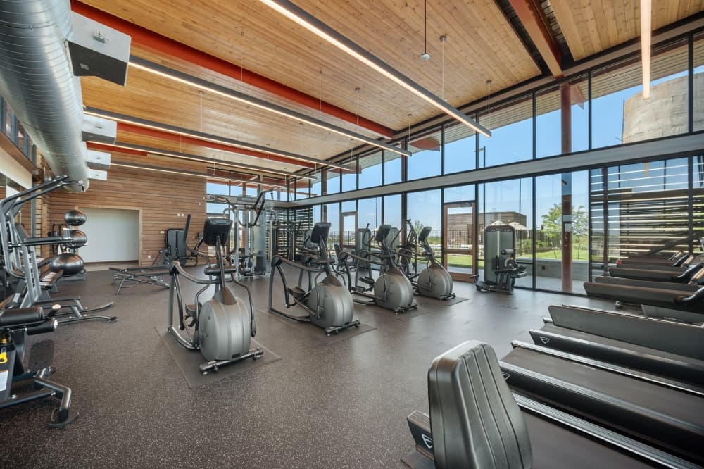State-of-the-art fitness center at Trails at Wildhorse Austin community with modern equipment, convenient East Austin location, and D.R. Horton homes nearby