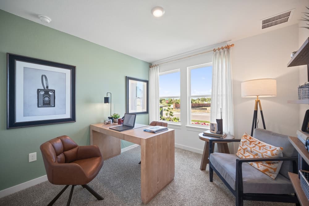 Home office in a D.R. Horton Trails at Wildhorse Austin home with flexible workspace, contemporary layout, and modern floor plan for working from home