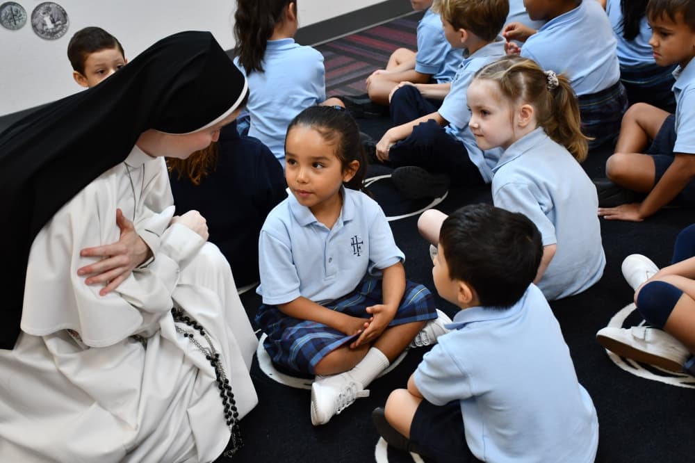 woman talking to child 
