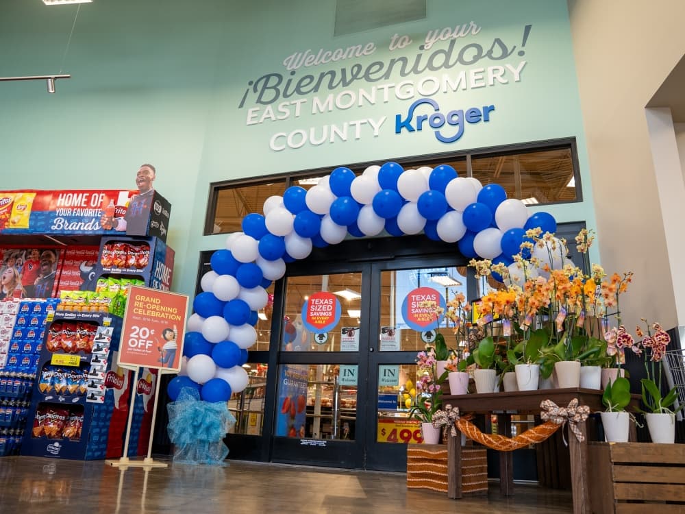 Balloon arch over interior doors at Kroger store in New Caney