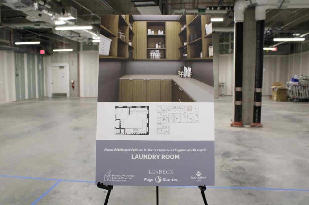 An image of a rendering of th laundry room inside the space where the house will be built. 
