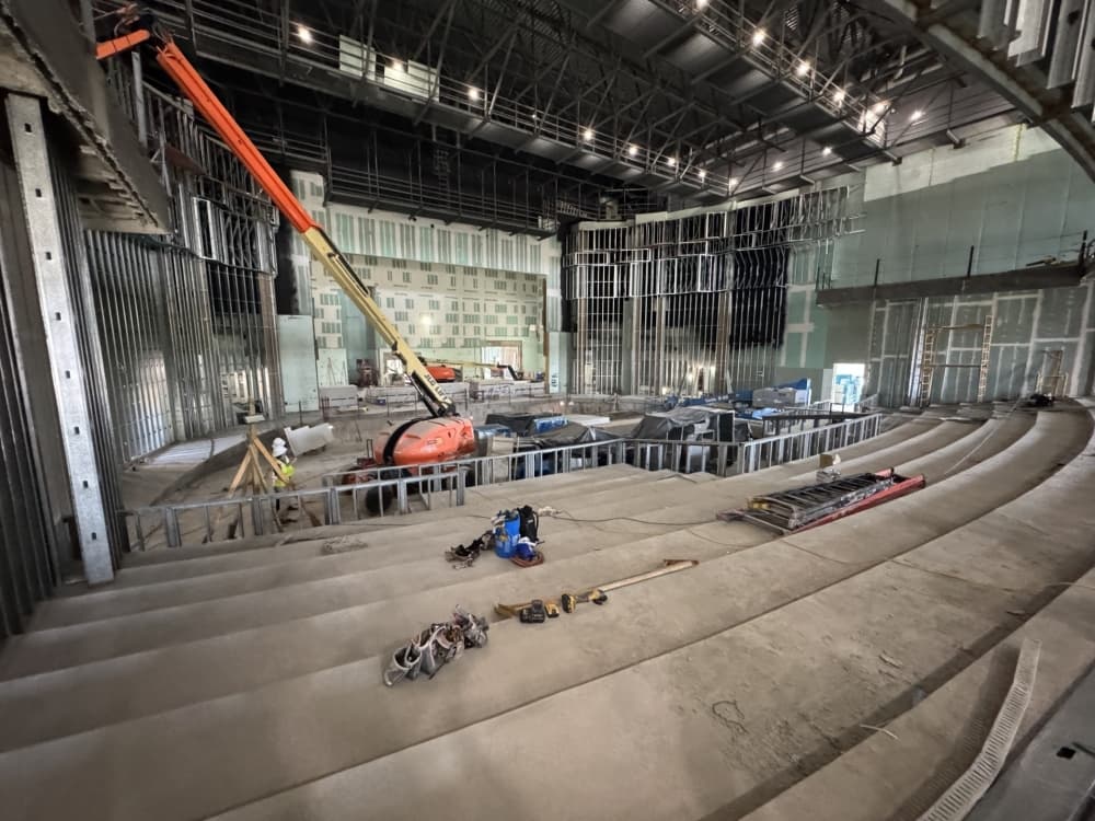 a side view from the balcony of a large performance hall