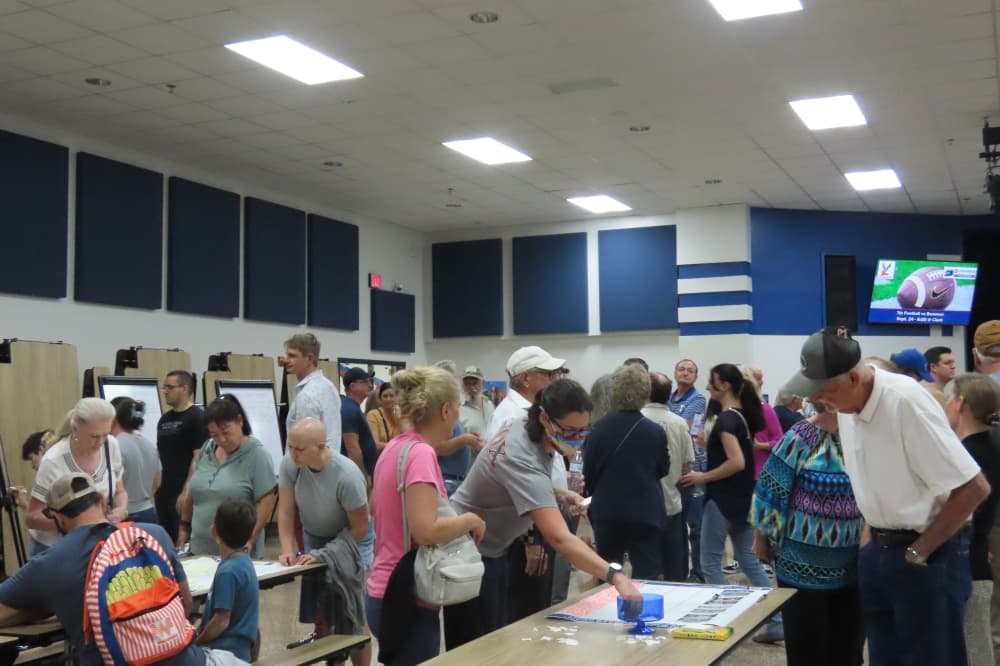 Plano officials asked residents for their preference on how the former schools should be redeveloped, including what level of housing density or style would be their preference as well as an “open-comment” white board and poster board for residents to add to. (Jacquelyn Burrer/Community Impact)