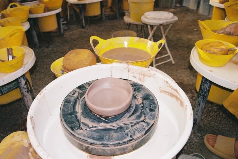Ceramic bowl on potter wheel