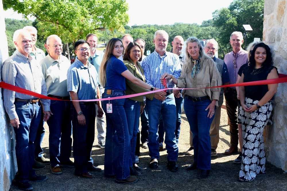 people at a ribbon cutting ceremony 