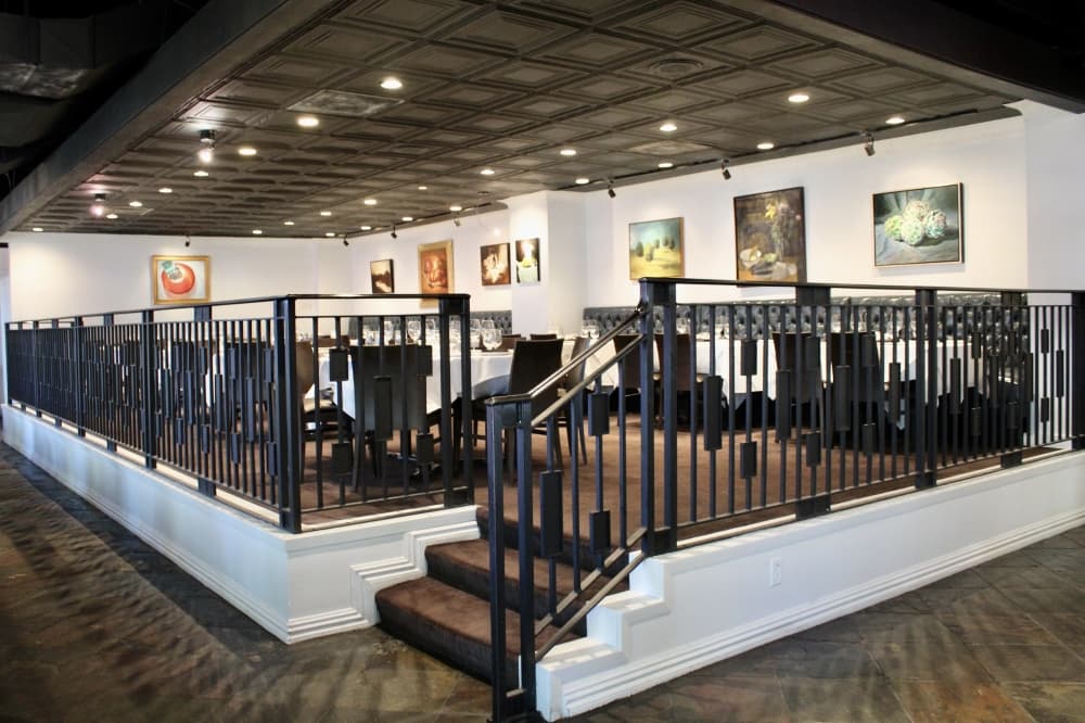 Amerigo’s Grille features a blend of contemporary art from local artists including the owners mother. (Courtesy Amerigo’s Grille)