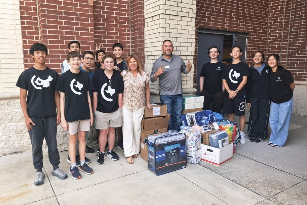 College Park High School robotics teams donate bedding to local nonprofit, Angel Reach