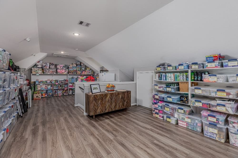a room with shelves of supplies