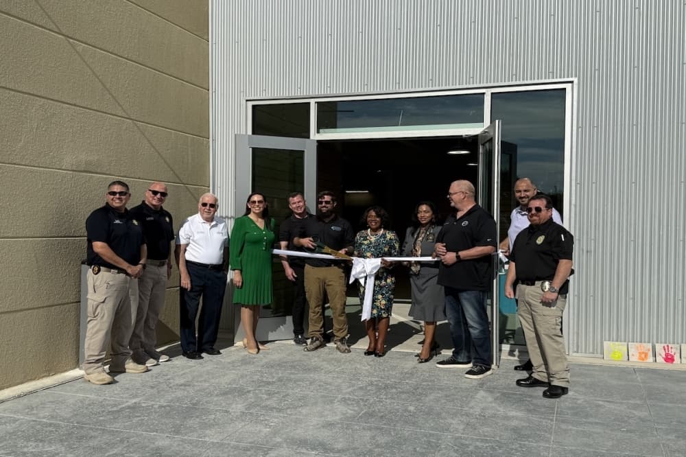 Alexendar Komet, chief executive office of Texas Pickle Hall, along with Live Oak city officials held a ribbon cutting on Sept. 29. (Andrew Creelman/Community Impact)