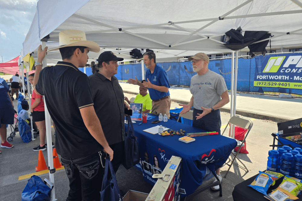 CASA of Galveston County volunteers and community supporters at a fundraising event, raising awareness and resources for children in foster care programs.