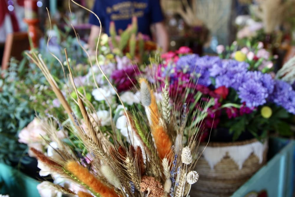 In addition to premade bouquets and custom arranging, Stone encourages customers to use the single stem florals to create their own designs in store. (Katlynn Fox/Community Impact)