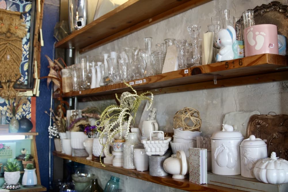 Stone offers vases for rent for events as well as a mixture of vintage and modern vases for sale. There is also a selection of free vases that customers can use for their arrangements. Stone said she is often inspired by the colors and shapes of vases when arranging a bouquet. (Katlynn Fox/Community Impact)