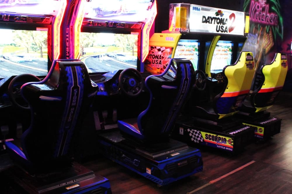 Racing video games in a dark room. 