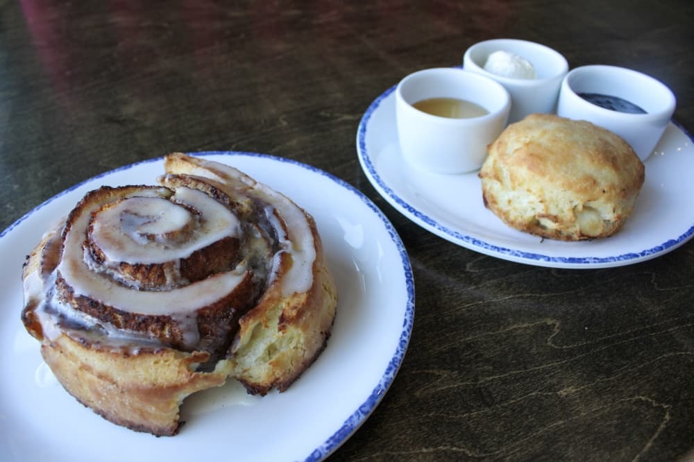 An image of the cinnamon roll and biscuit. 