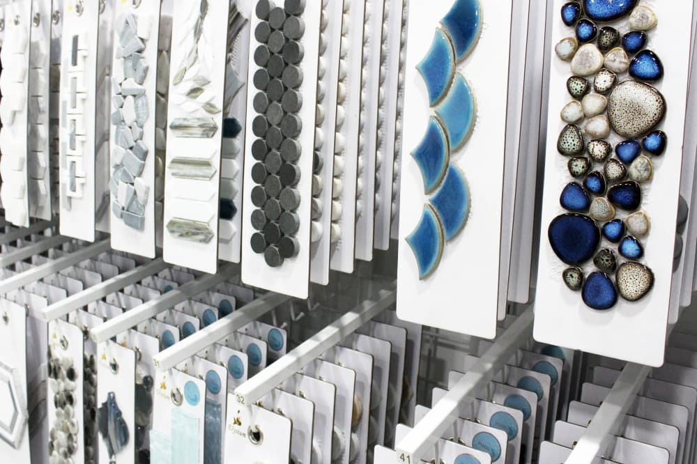 Backsplash samples on display in a store. 