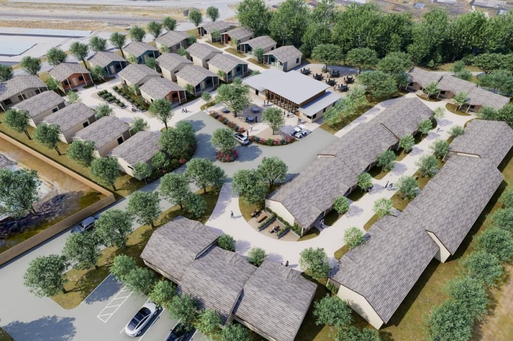 a rendering of an aerial view of apartment homes