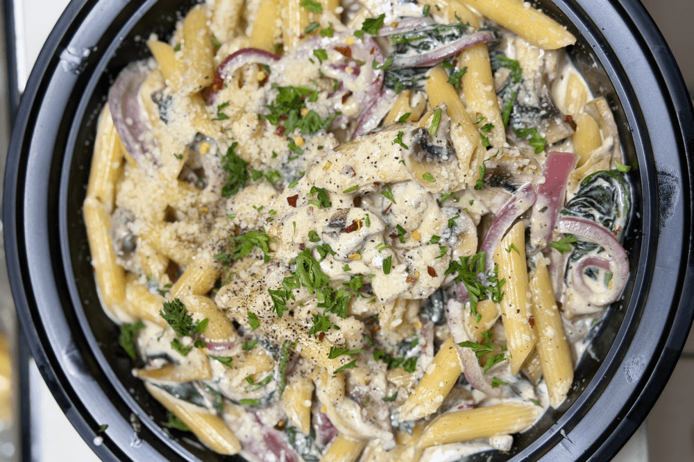 Fresh homemade pasta at Russo’s New York Pizzeria Spring, including lasagna, fettuccine alfredo, spaghetti with meatballs, and Italian specialties