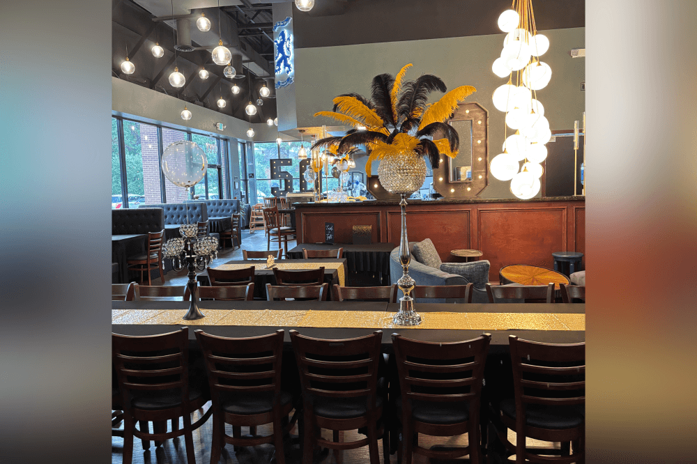 Guests enjoying live music and custom dining at The Blue Lion Pub in The Woodlands — a top Texas venue for birthdays, holiday parties, and special celebrations.