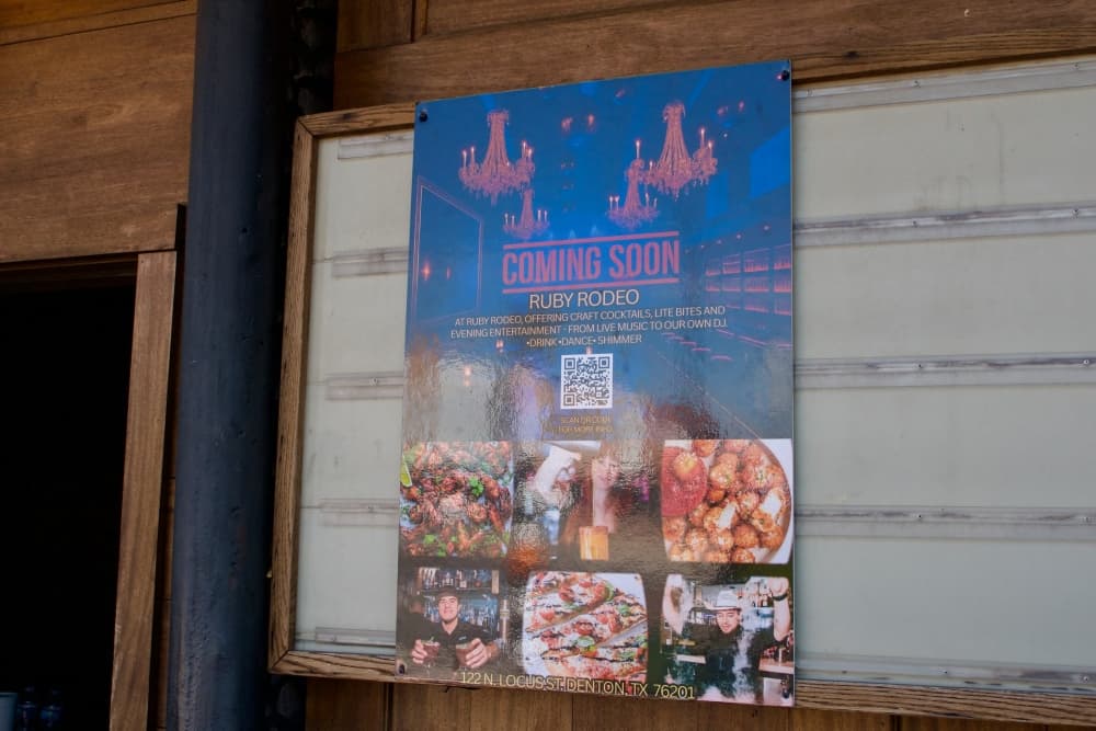 A close-up of a sign advertising Ruby Rodeo in donwtown Denton