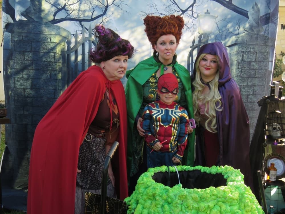 An image of people dressed in costume from a previous event. 