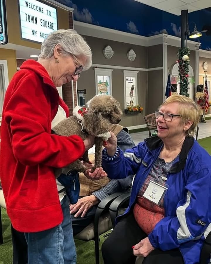 Visits from Therapy Pet Pals' dogs may provide mental health benefits for those in care facilities, according to the organization's website. (Courtesy Therapy Pet Pals of Texas)