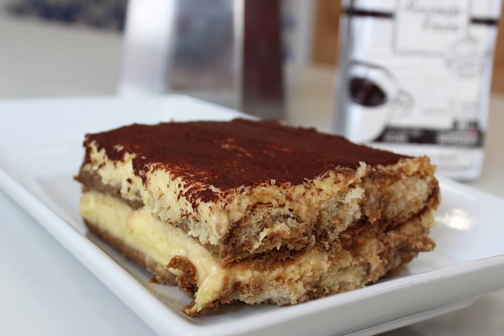 Slice of tiramisu on a plate. 