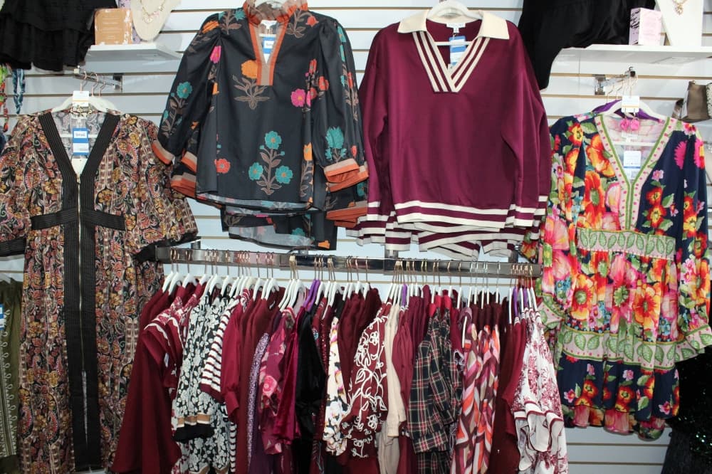 Women's clothing displayed in a store. 