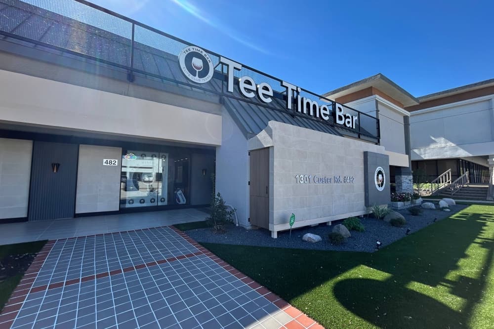 Exterior of a business with Tee Time Bar signage. 