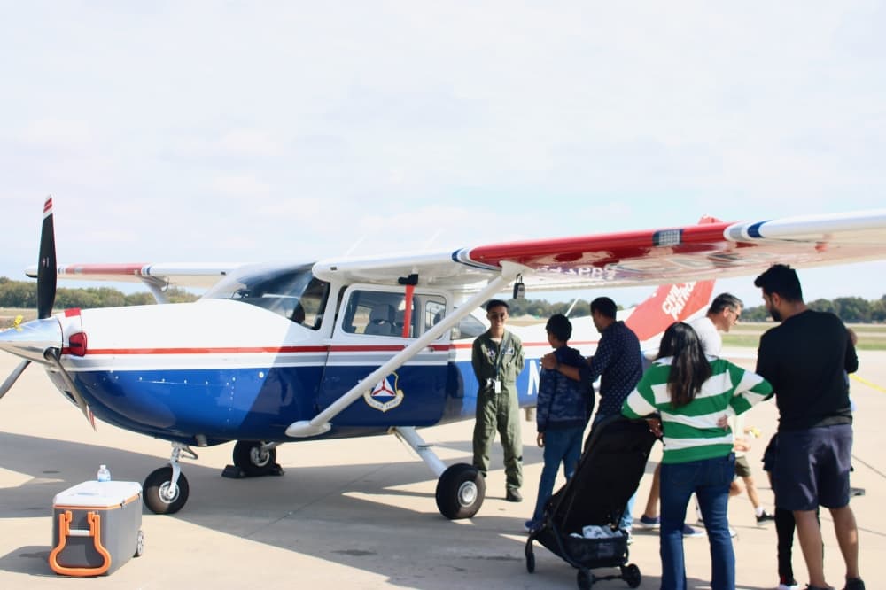 Plane and people in line